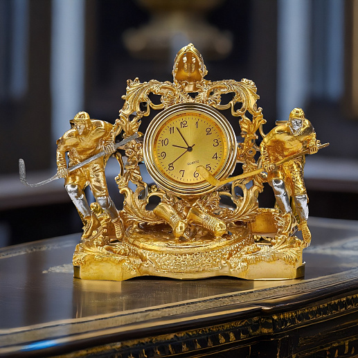 Настольные часы "Хоккеисты" позолоченные.