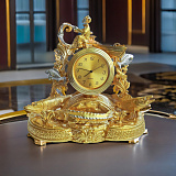 Настольные часы "Рыбалка на лодке" позолоченные.